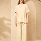 Cheesecloth trouser set with gold button shoulders in Beige