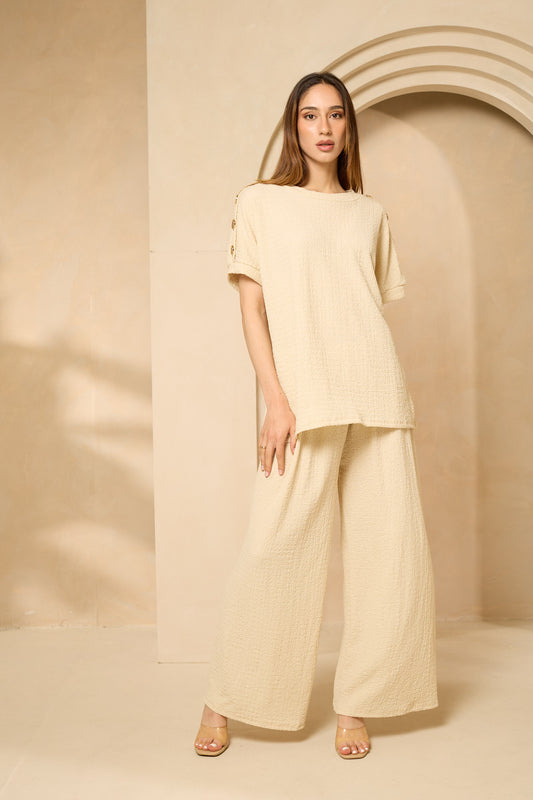 Cheesecloth trouser set with gold button shoulders in Beige