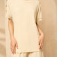 Cheesecloth trouser set with gold button shoulders in Beige