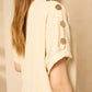 Cheesecloth trouser set with gold button shoulders in Beige
