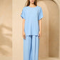 Cheesecloth trouser set with gold button shoulders in Sky