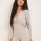 Soft ribbed wrap over co-ord in Beige
