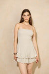 Frilly bandeau playsuit in Beige